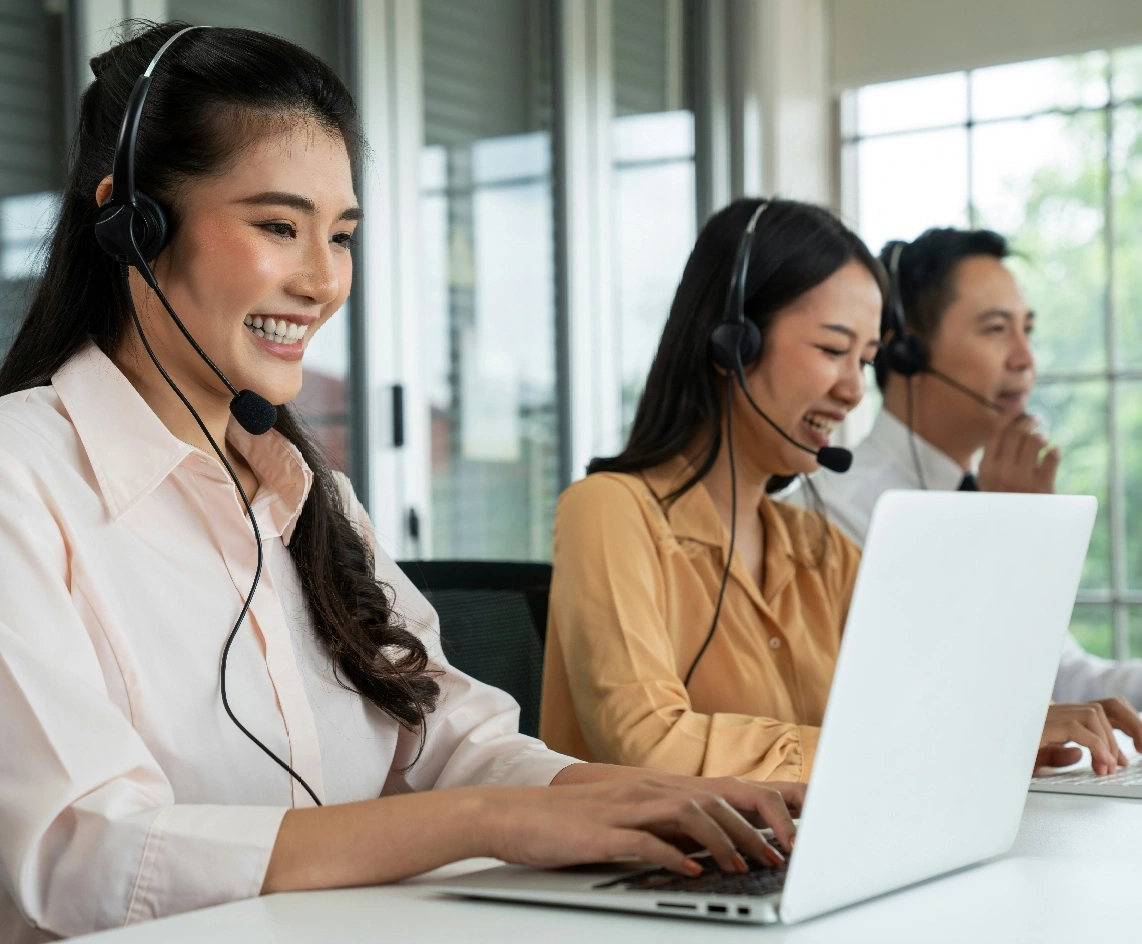 Smiling woman with laptop customer support