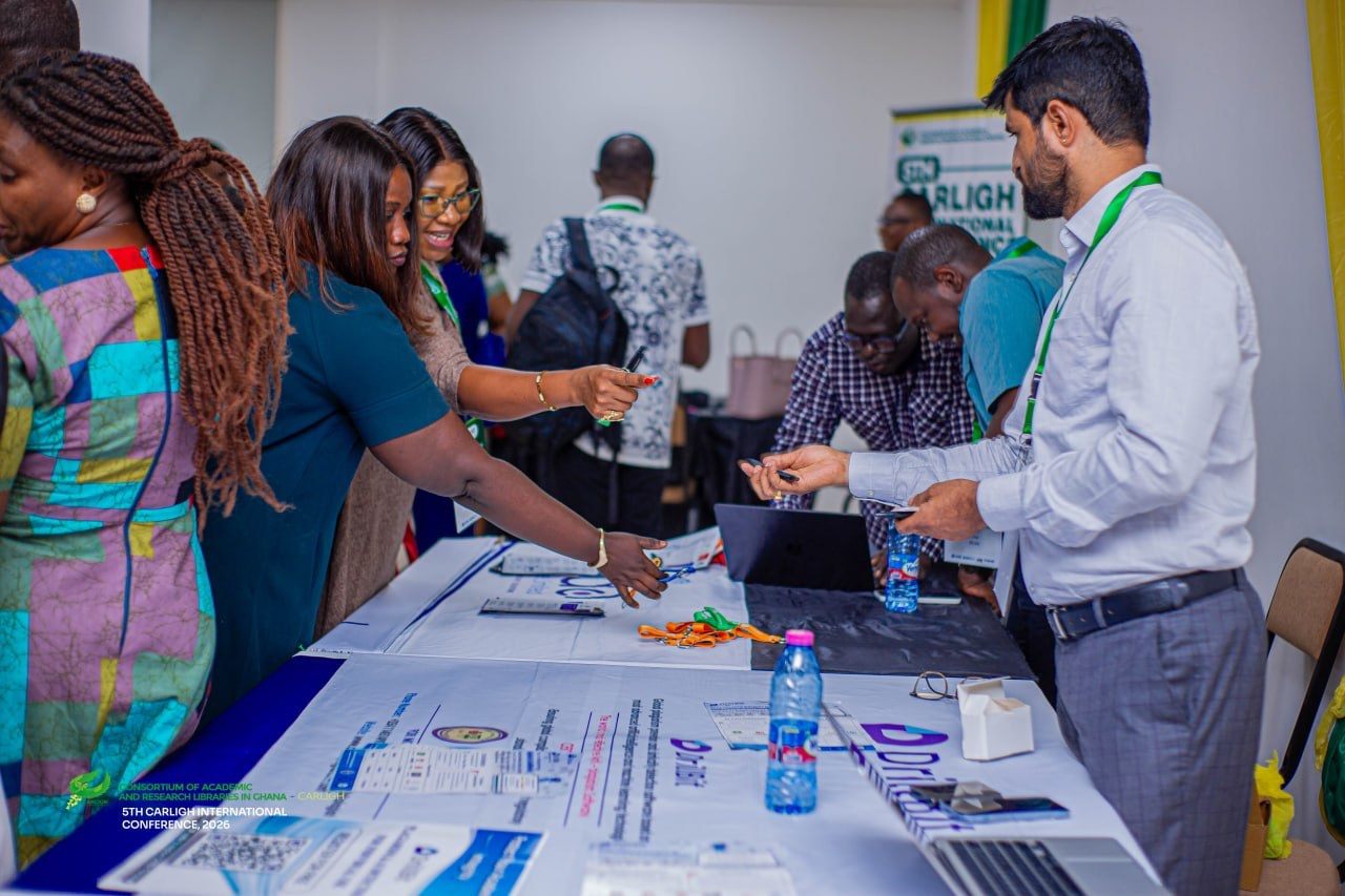 Delegates at the DrillBit exhibition table, CARLIGH 2026