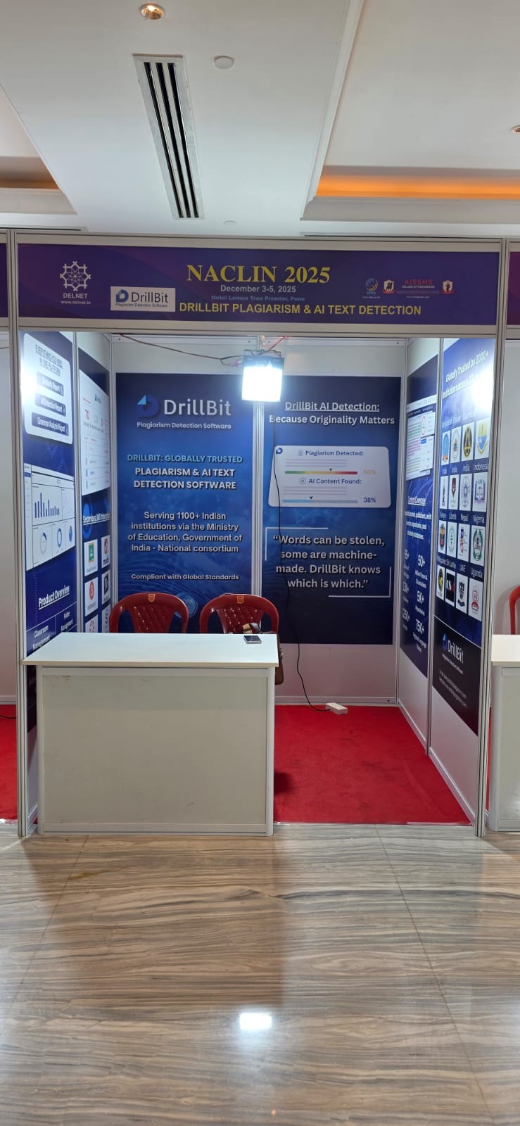 DrillBit exhibition booth setup at NACLIN 2025